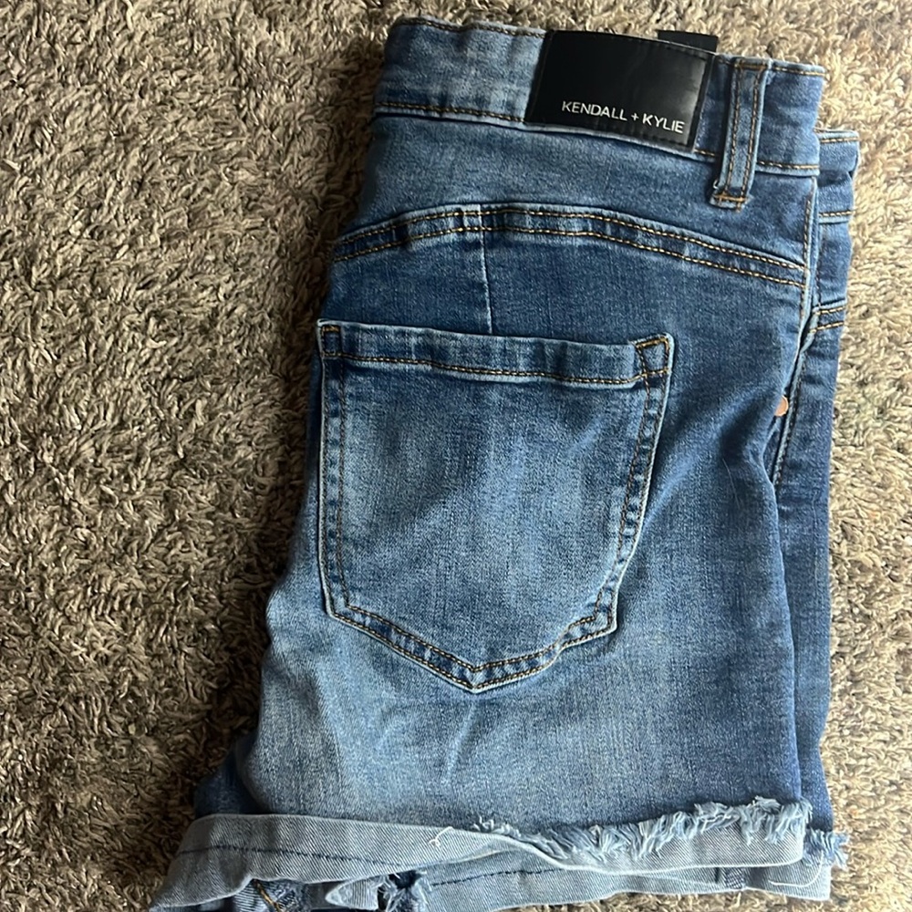 I am selling Kendall + Kylie shorts in the color blue size 13/13
